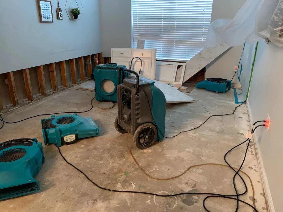 Dehumidifier in flood-cut room for Water Damage Restoration in Portage